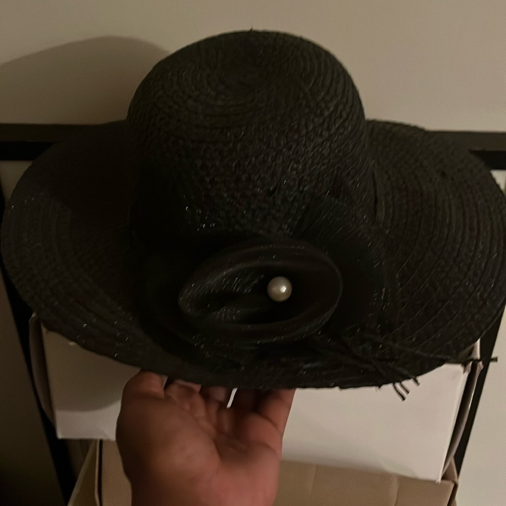 Women’s black knit hat and women’s tan hat